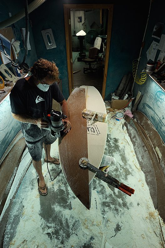 shaping a surfboard