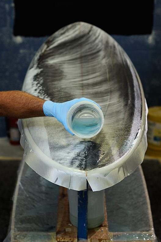fiberglassing a surfboard
